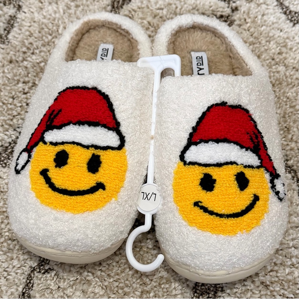 NWT Katydid Holiday Slippers with Yellow Smiley and Red Santa Hat.
